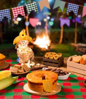 FESTAS JUNINAS E JULINAS: POR QUE A COMBINAÇÃO DE ALGUNS ALIMENTOS PODE PESAR NO ESTÔMAGO?